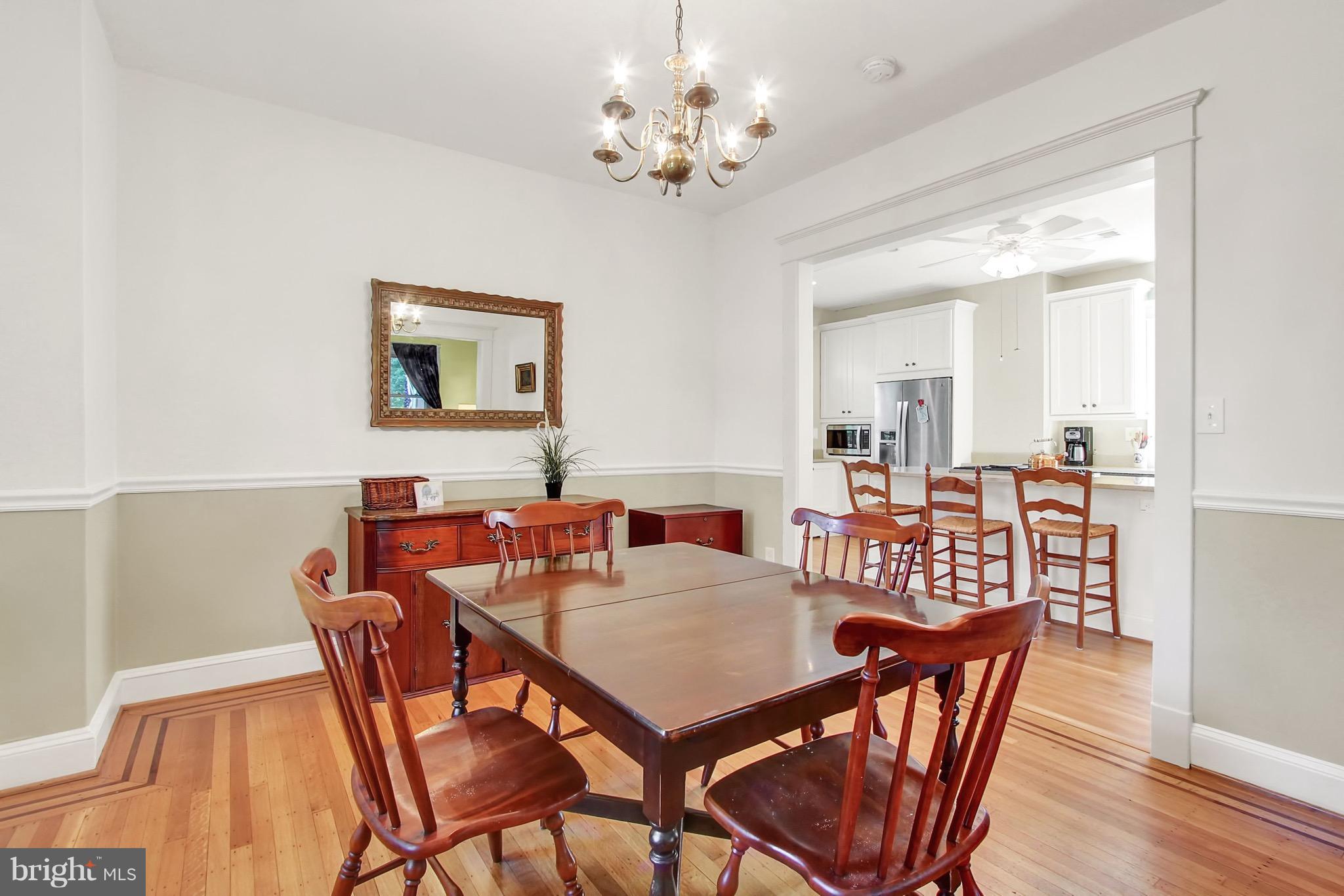600 Murdock Road Baltimore, MD 21212 - Photo 10 of 30 a view of a dining room with furniture and wooden floor