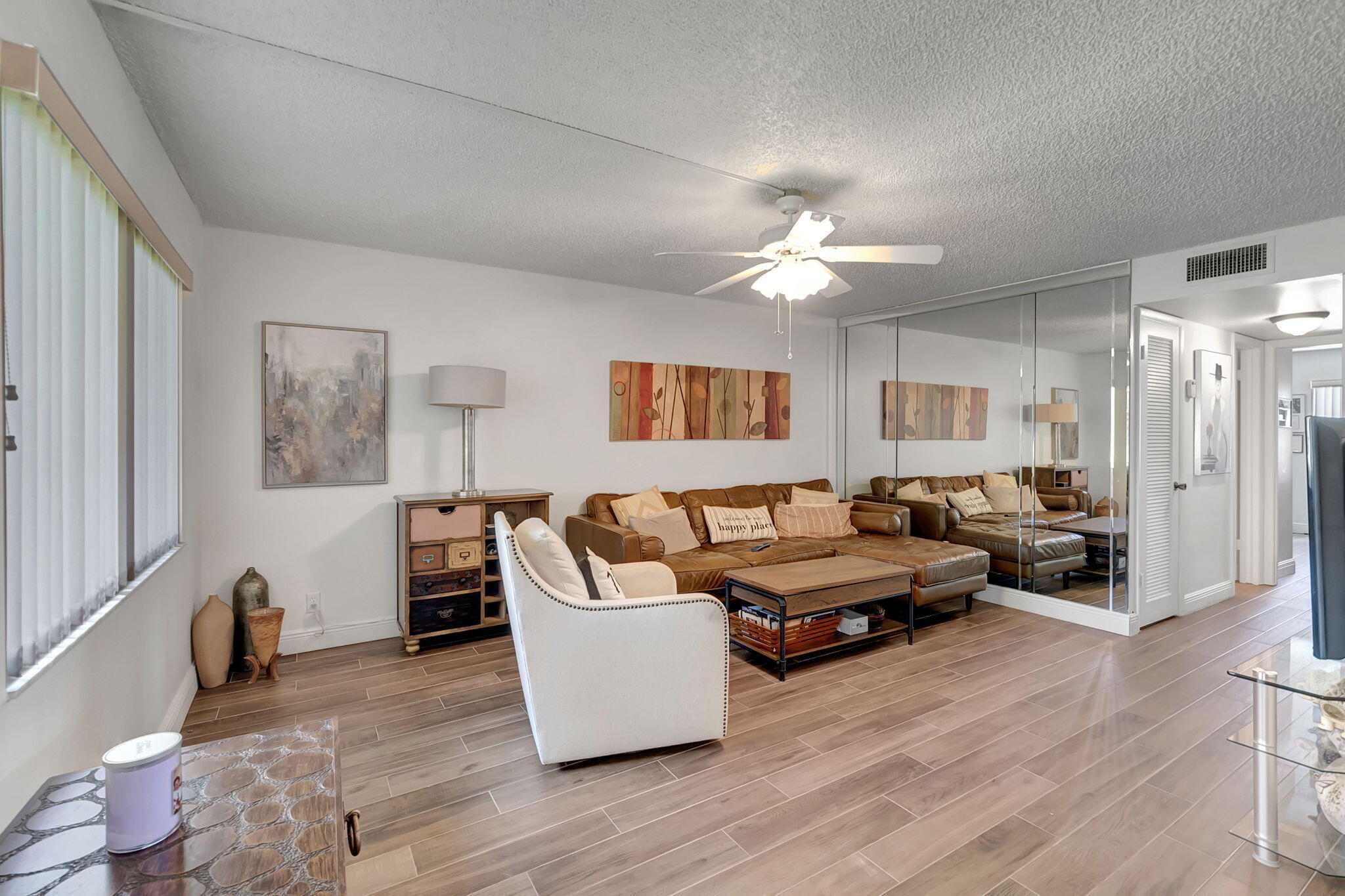 66 Capri B Delray Beach, FL 33484 - Photo 14 of 62 a living room with furniture and wooden floor