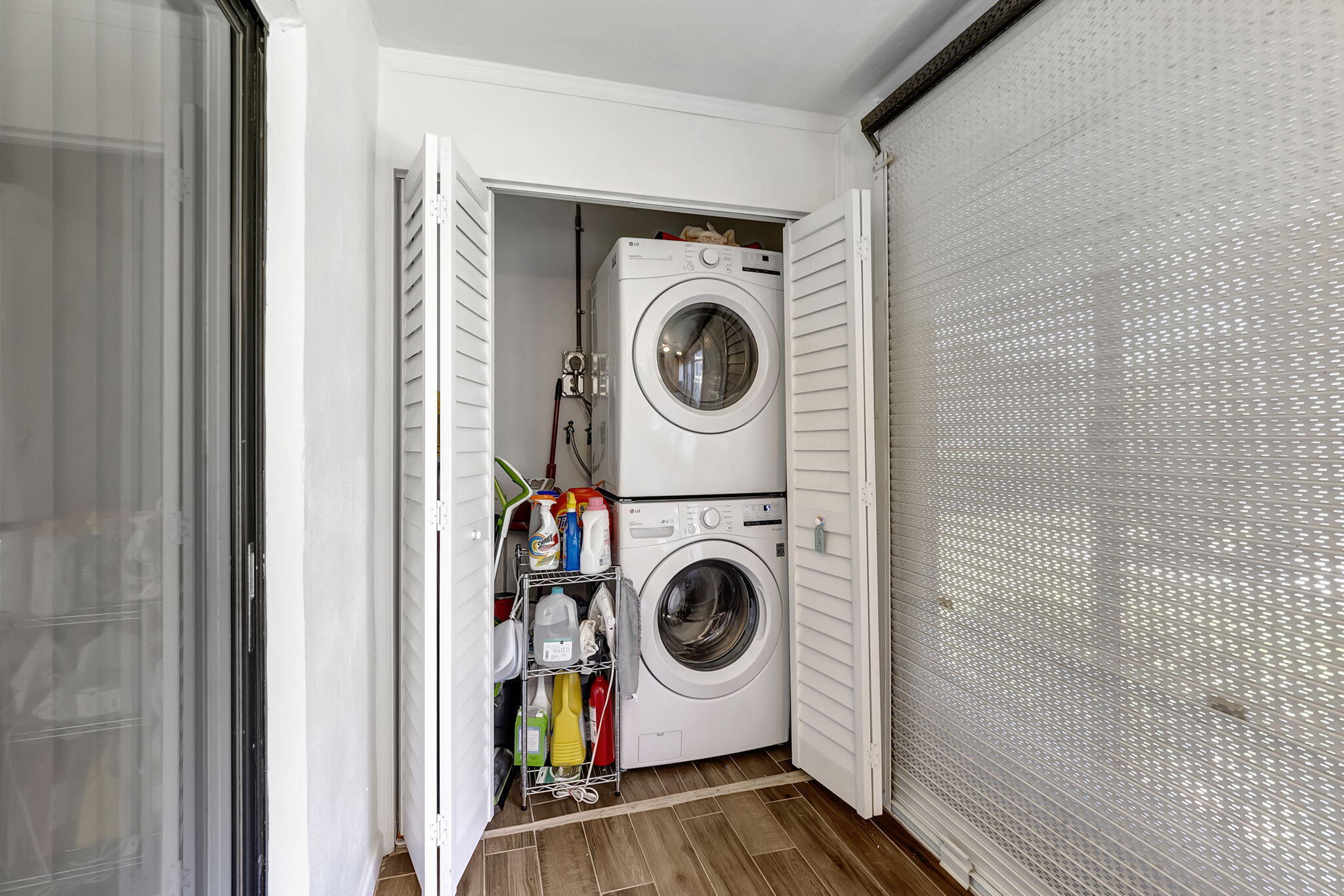 66 Capri B Delray Beach, FL 33484 - Photo 5 of 62 a utility room with dryer and washer