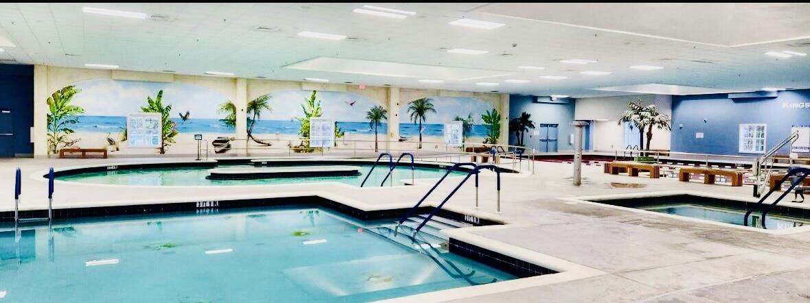 66 Capri B Delray Beach, FL 33484 - Photo 60 of 62 a room with lots of table and chairs