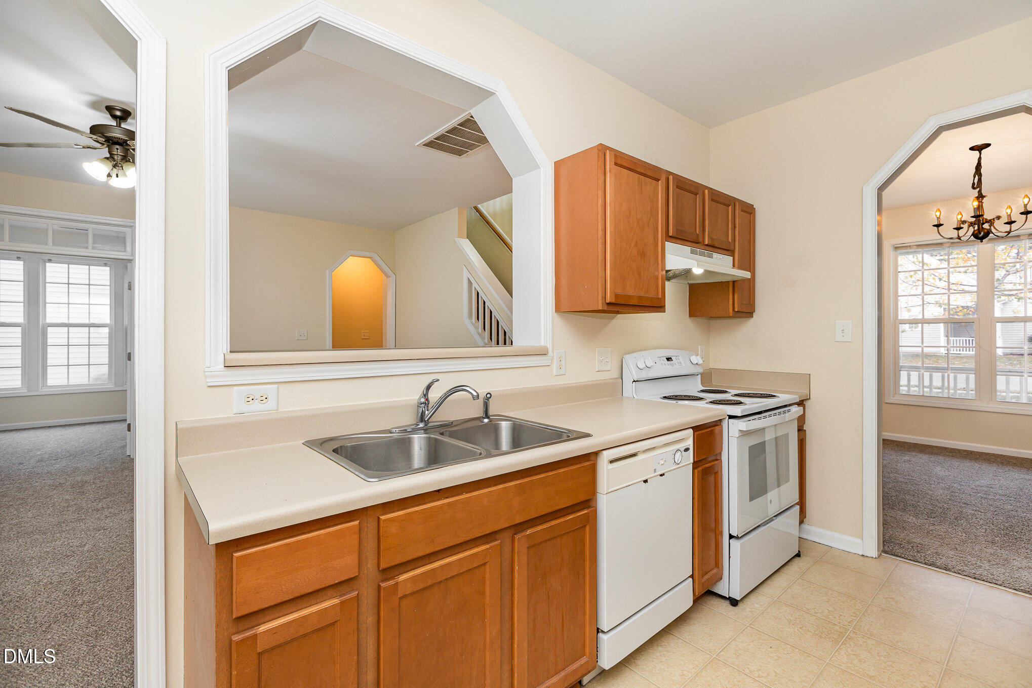 2124 Star Sapphire Drive Raleigh, NC 27610 - Photo 12 of 23 a bathroom with a sink and a mirror