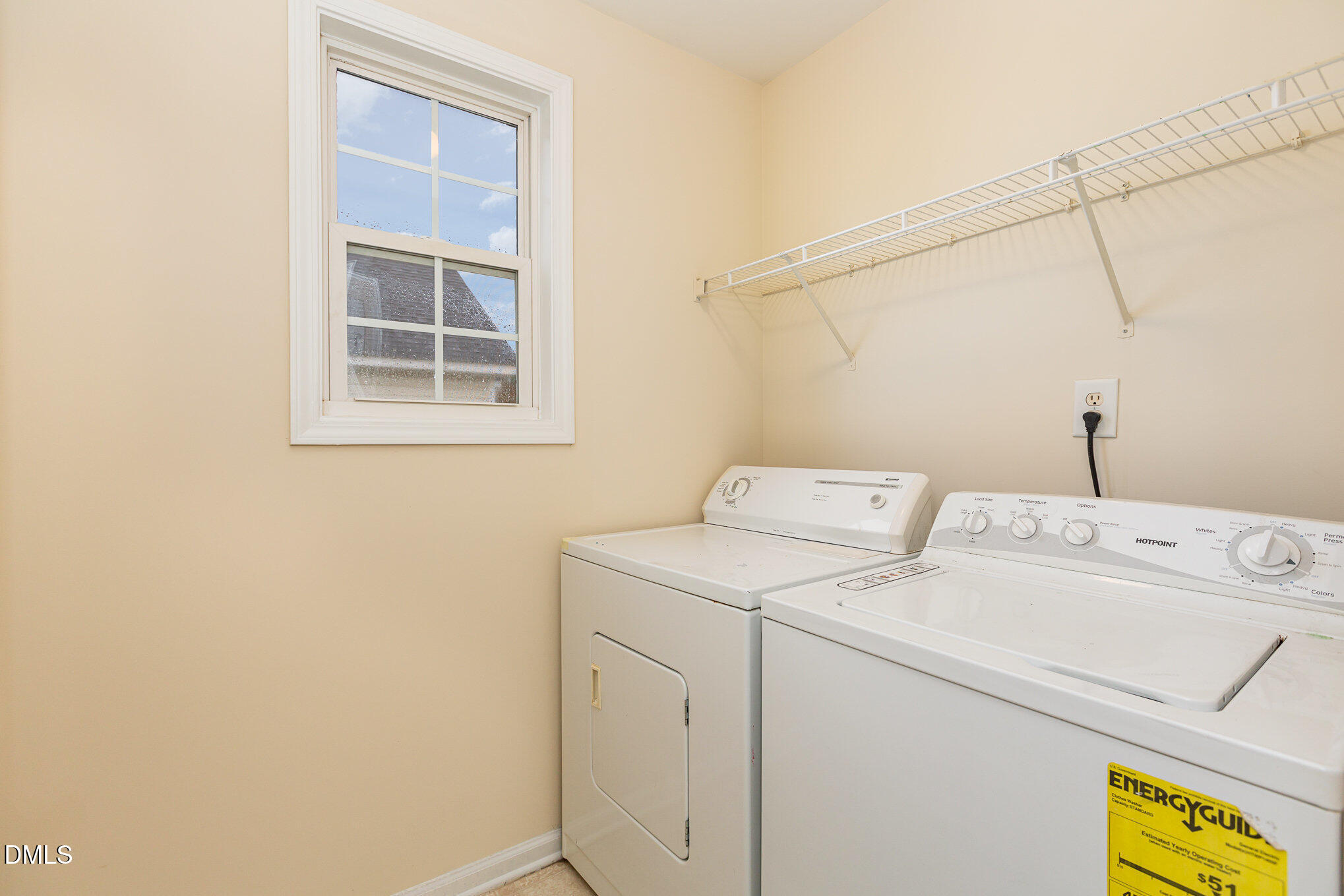 2124 Star Sapphire Drive Raleigh, NC 27610 - Photo 13 of 23 a utility room with dryer and washer