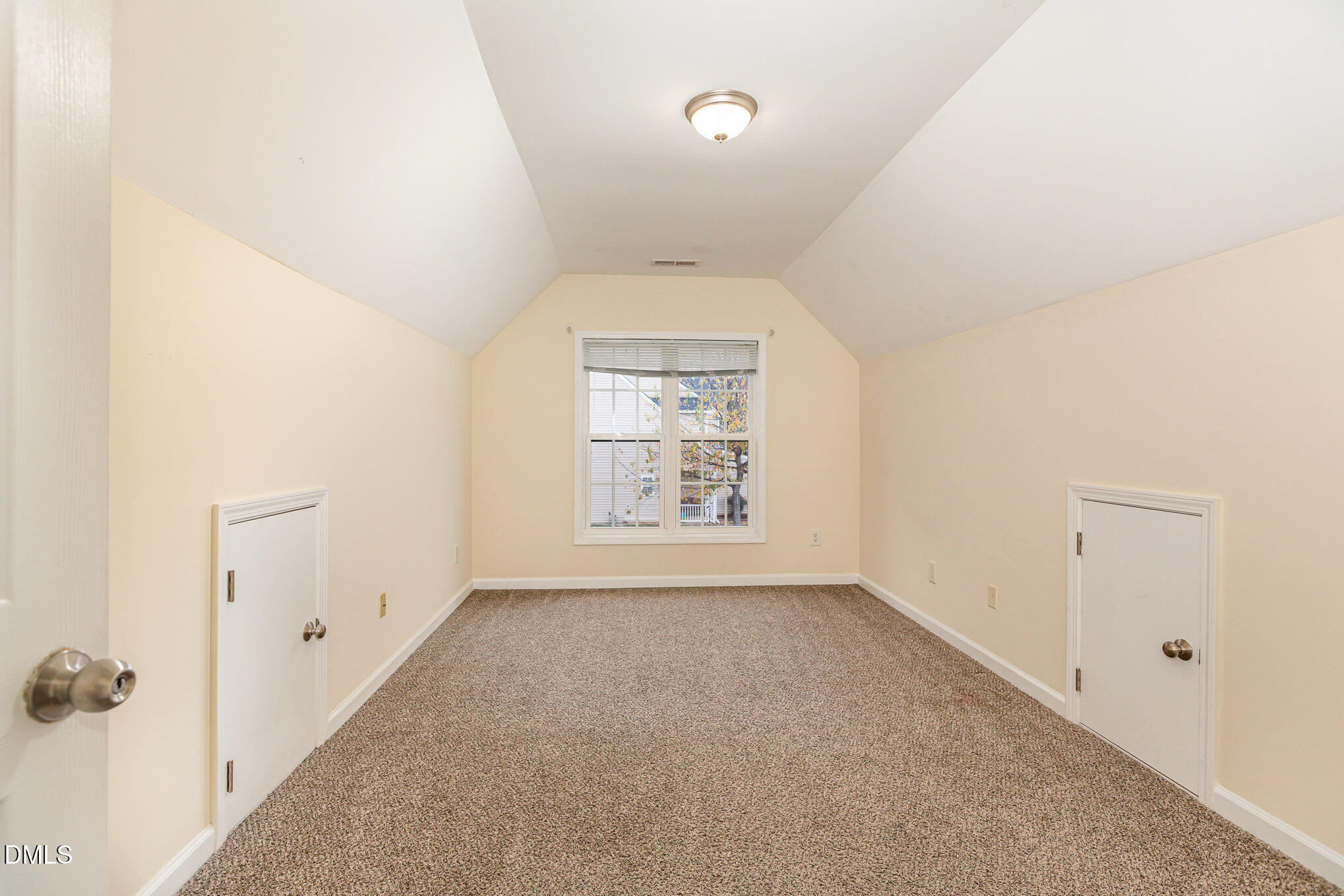 2124 Star Sapphire Drive Raleigh, NC 27610 - Photo 21 of 23 a view of an empty room with a window