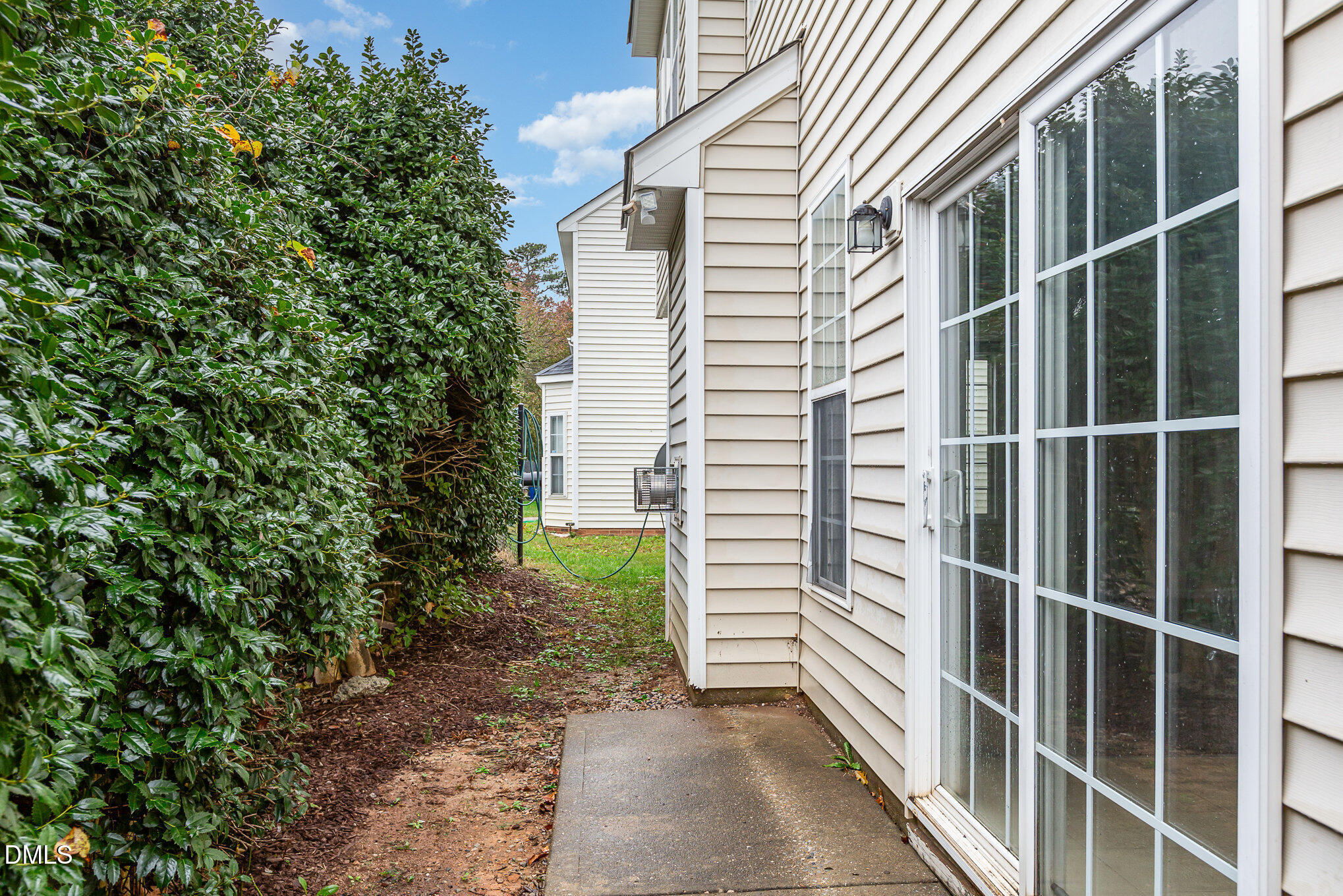 2124 Star Sapphire Drive Raleigh, NC 27610 - Photo 23 of 23 a view of potted plants with large trees