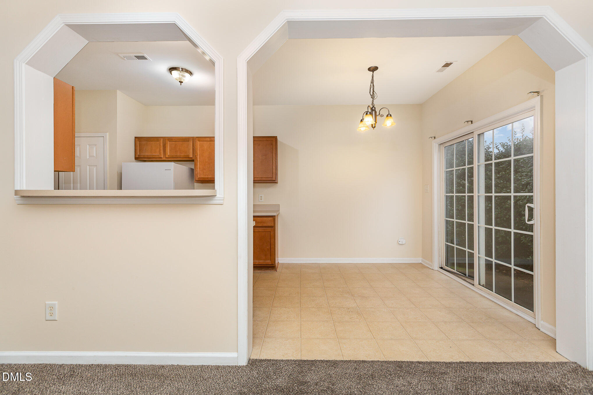 2124 Star Sapphire Drive Raleigh, NC 27610 - Photo 9 of 23 view of a room with a ceiling fan and window