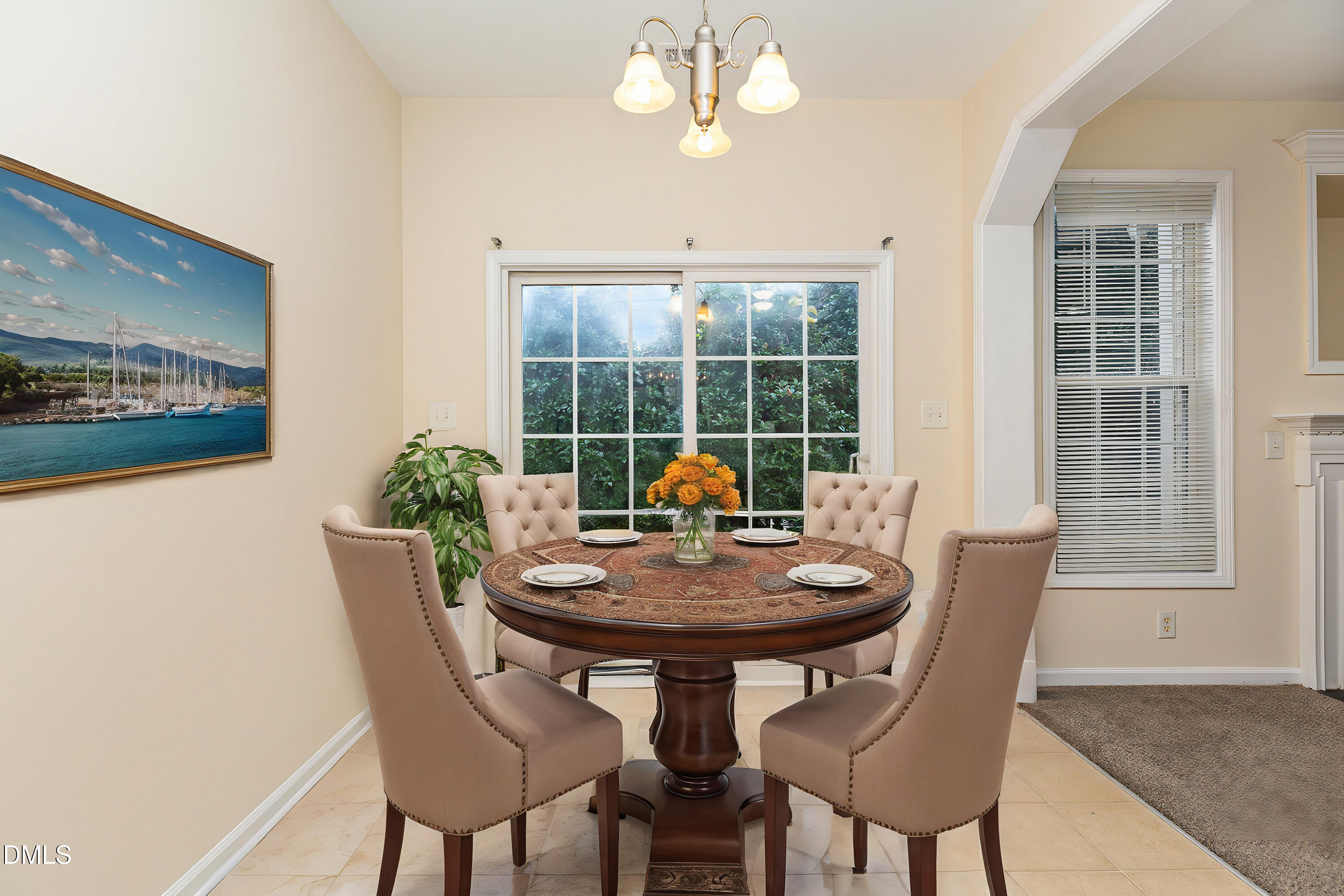 2124 Star Sapphire Drive Raleigh, NC 27610 - Photo 10 of 23 a view of a dining room with furniture window and outside view