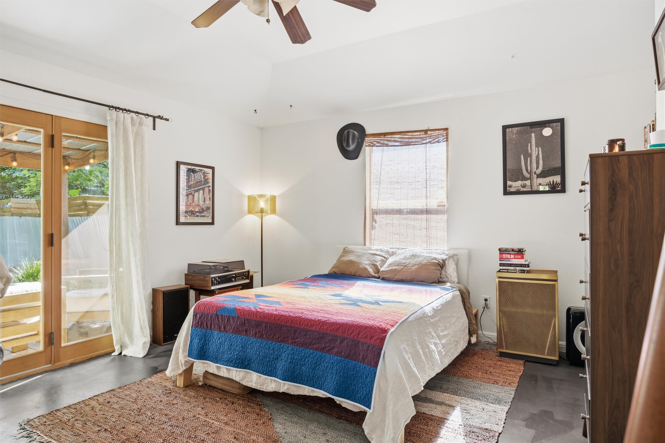 3015 Castro Street Austin, TX 78702 - Photo 21 of 40 A well-lit bedroom provides direct access to the outdoors, promoting an indoor-outdoor lifestyle.