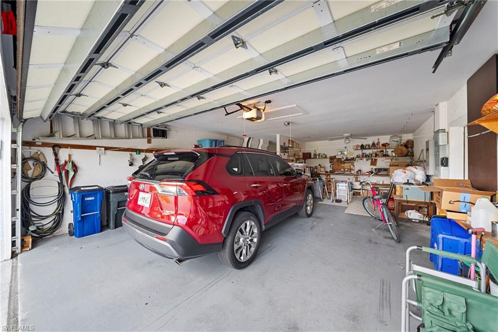 3971 Spring Garden Lane Estero, FL 33928 - Photo 26 of 31 a view of car garage
