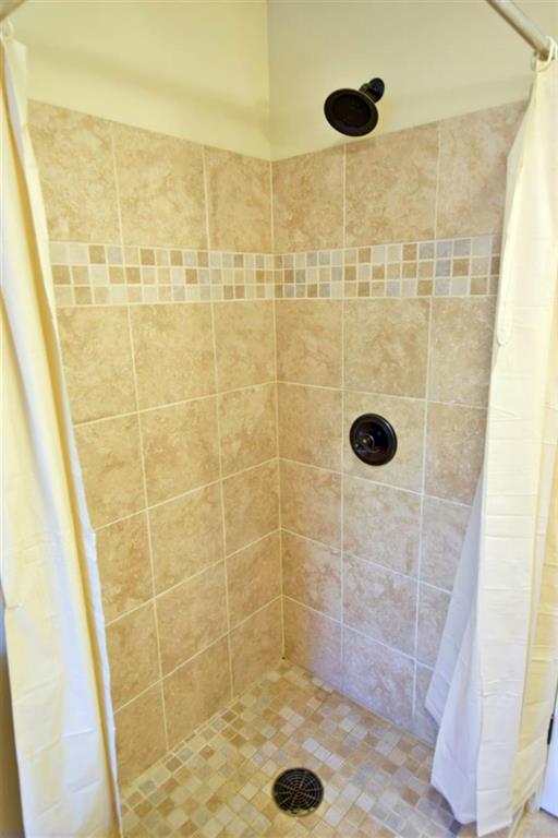 213 Tannery Brook Road Ellsworth, ME 04605 - Photo 20 of 35 Tiled shower with brushed bronze...