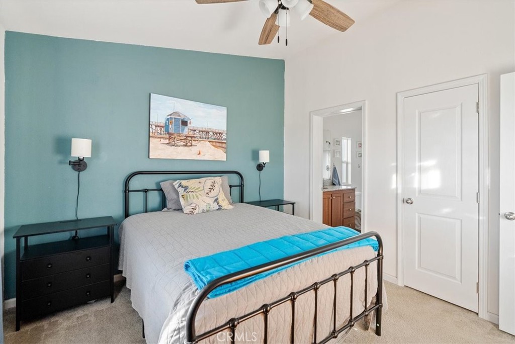 1730 Sutliff Road San Miguel, CA 93451 - Photo 18 of 57 a bedroom with a bed and a painting on the wall