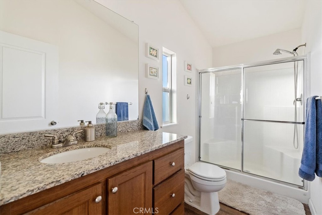 1730 Sutliff Road San Miguel, CA 93451 - Photo 19 of 57 a bathroom with a granite countertop sink toilet and shower