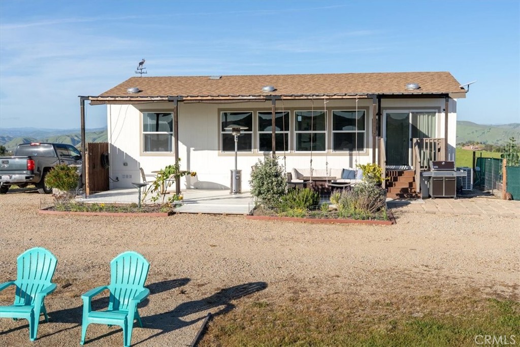 1730 Sutliff Road San Miguel, CA 93451 - Photo 27 of 57 a front view of a house with a yard outdoor seating space