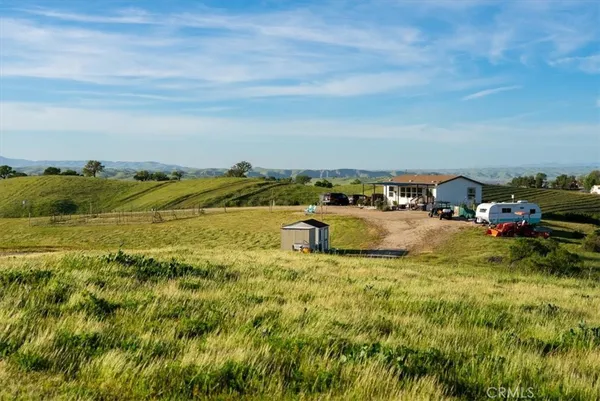 an aerial view of a house with outdoor space swimming pool and outdoor seating