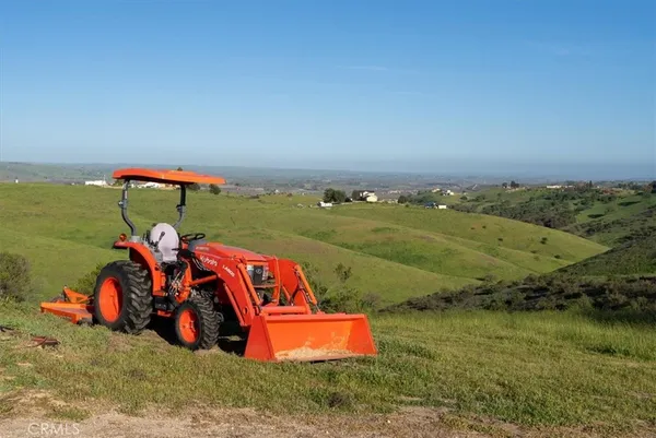 a view of a chairs and table in the terrace