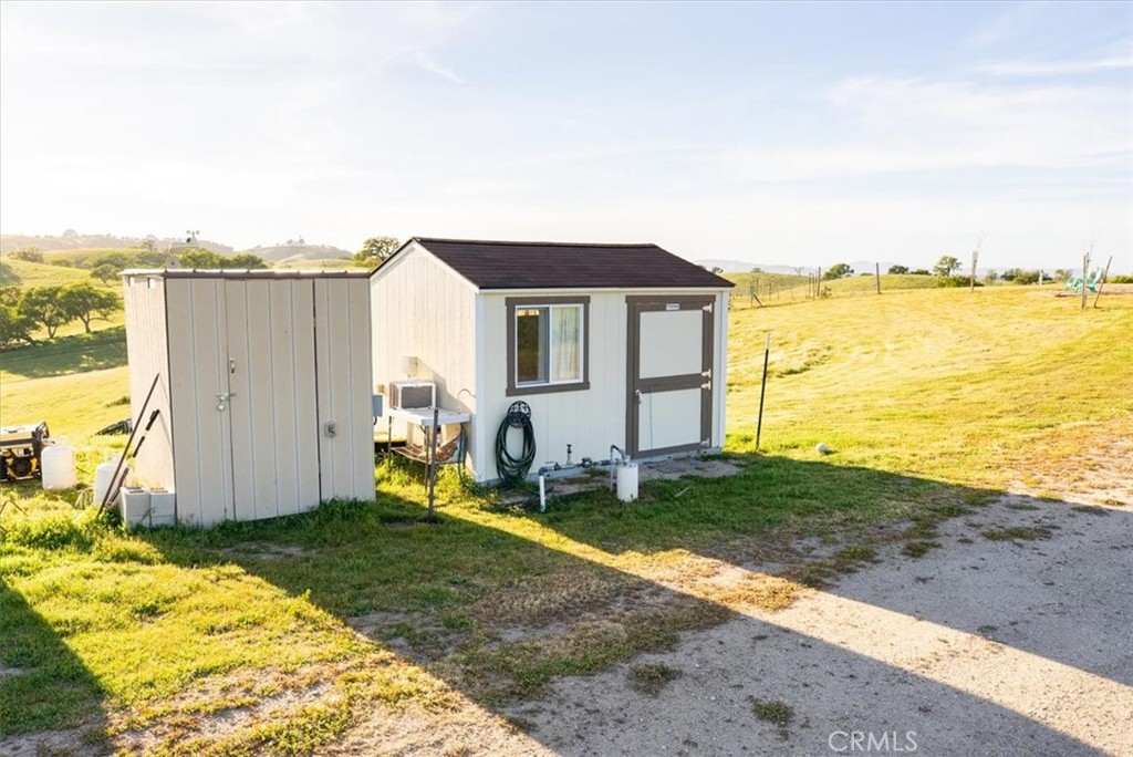 1730 Sutliff Road San Miguel, CA 93451 - Photo 39 of 57 a backyard of a house with wooden fence