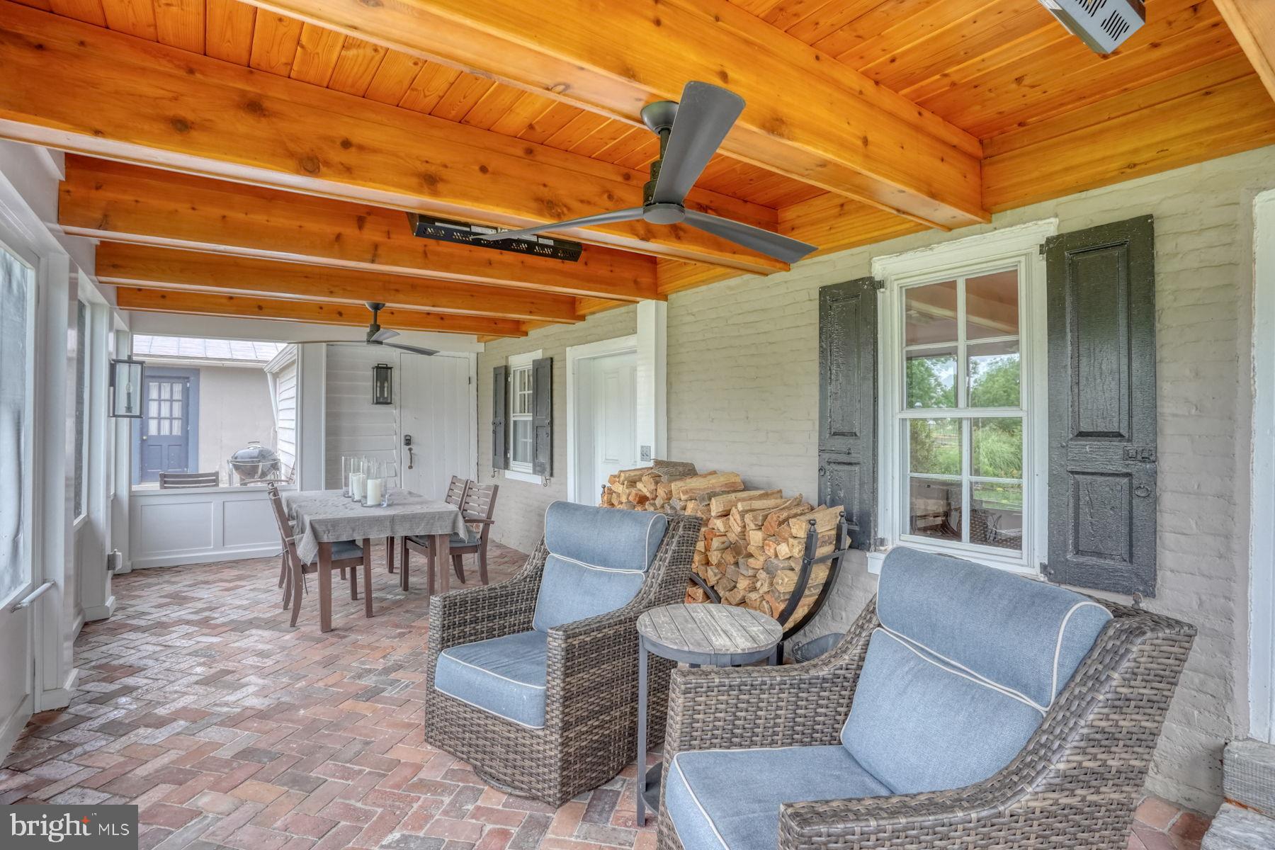 2 The Strand New Castle, DE 19720 - Photo 26 of 80 a outdoor living space with furniture and a potted plant