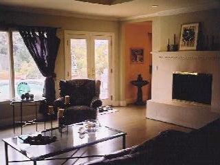 14 Inverness Drive San Rafael, CA 94901 - Photo 3 of 7 a living room with furniture and a fireplace