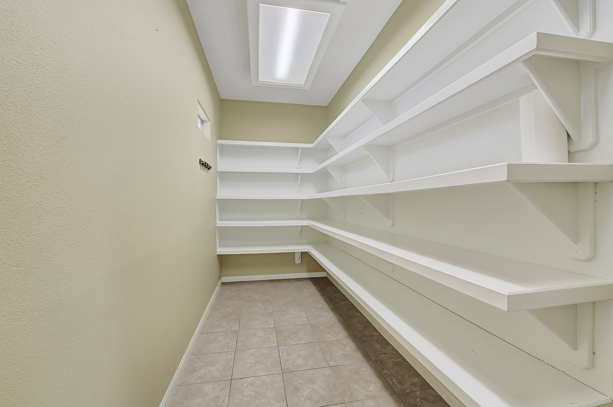 1004 8th Street Dickinson, TX 77539 - Photo 11 of 42 a view of an empty walk in closet