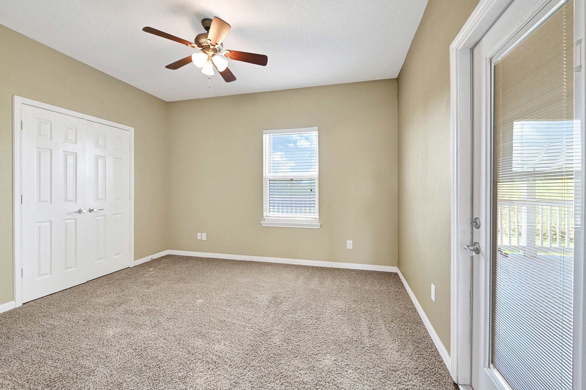 1004 8th Street Dickinson, TX 77539 - Photo 20 of 42 a view of an empty room with a window
