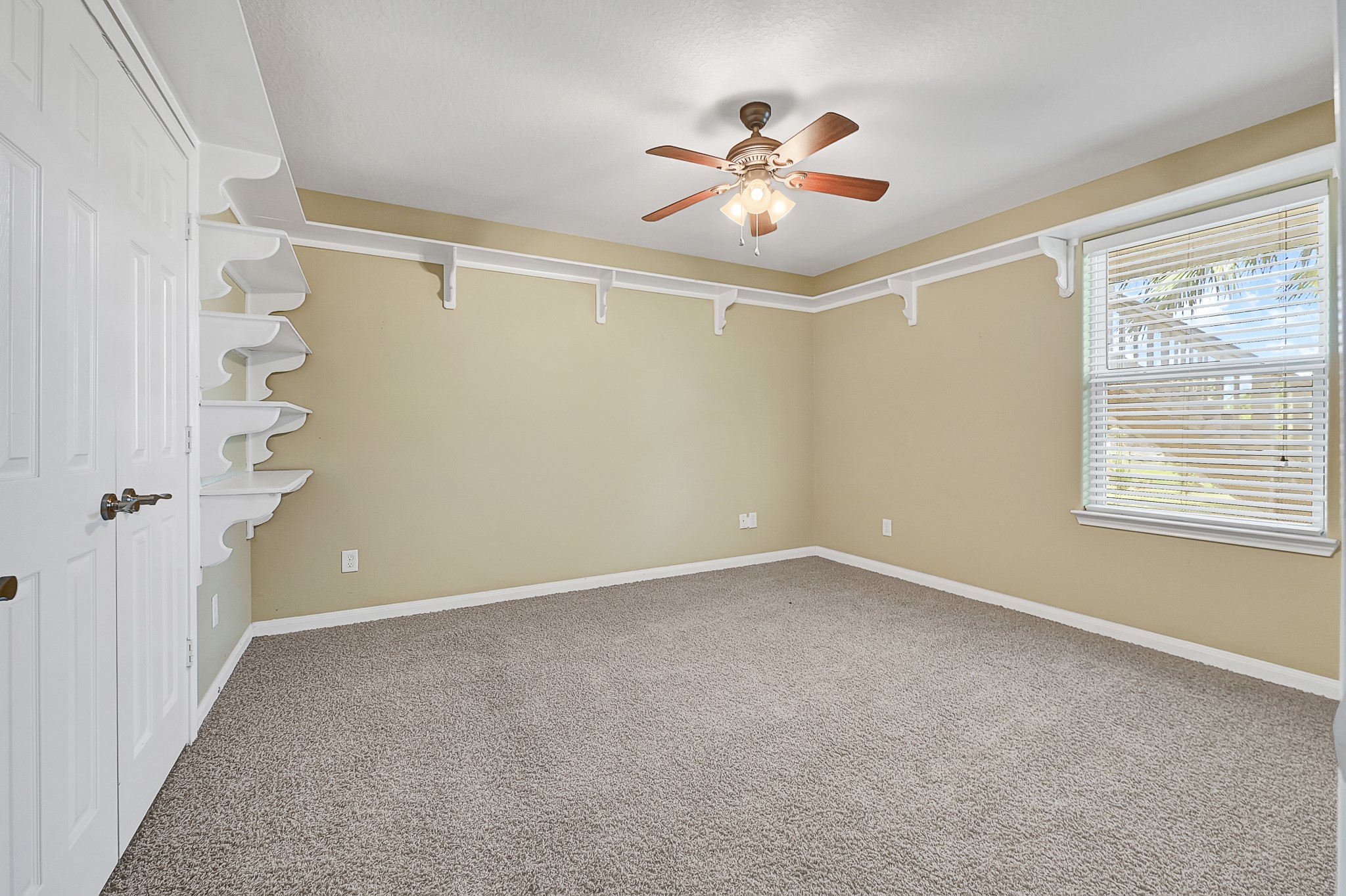 1004 8th Street Dickinson, TX 77539 - Photo 30 of 42 a view of an empty room with a window