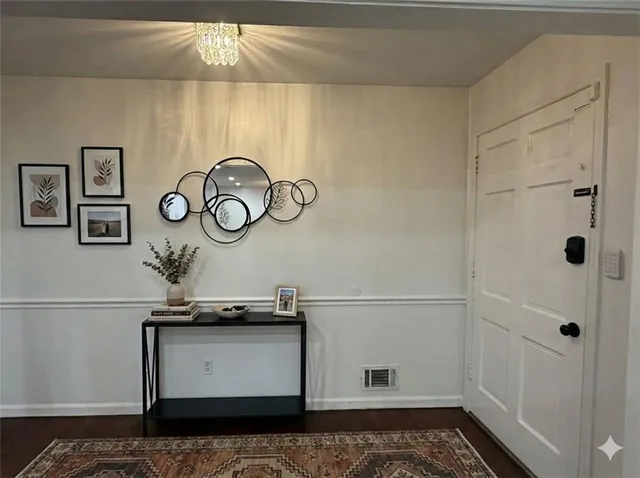 a view of a hallway with elevator