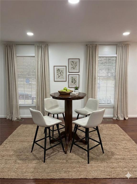 1438 Oak Forest Court Northeast Brookhaven, GA 30319 - Photo 6 of 15 a dining room with furniture and window