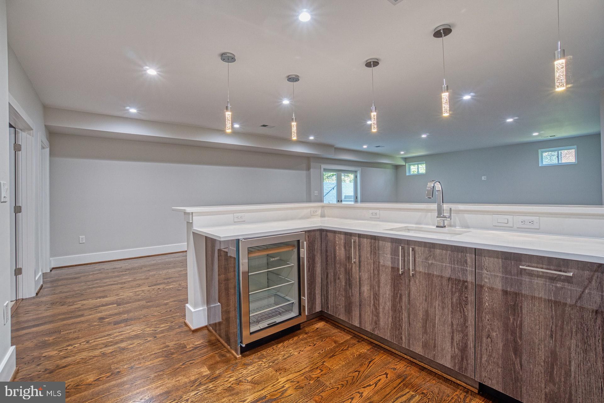 7419 Nigh Road Falls Church, VA 22043 - Photo 43 of 50 Spectacular bar w/ a beverage cooler &dishwasher