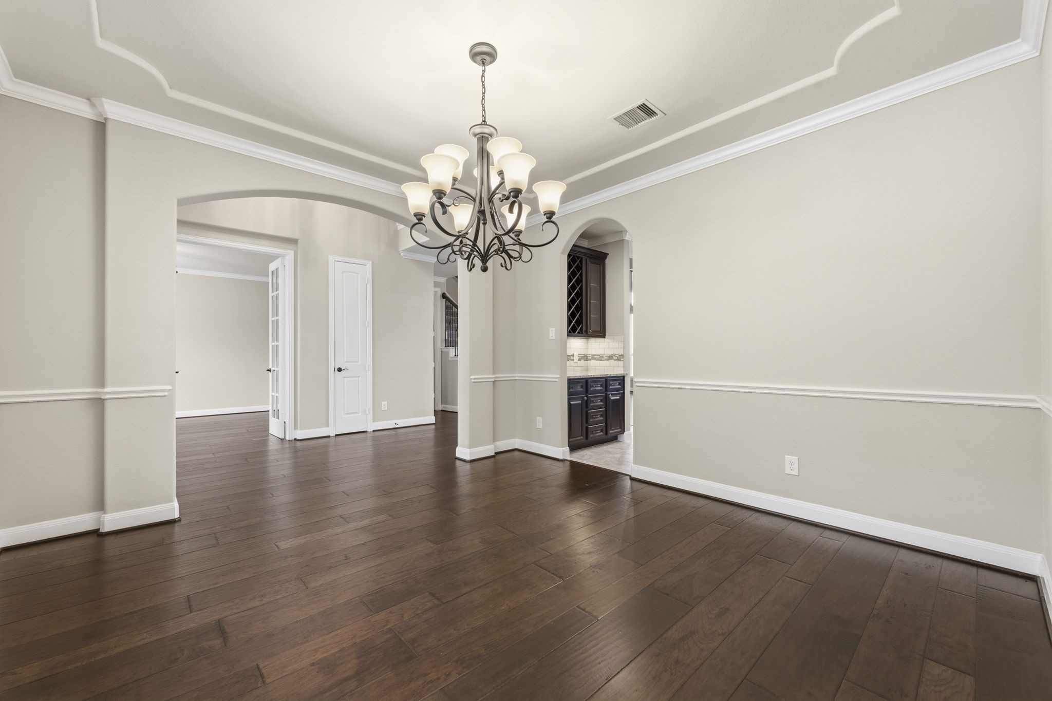 25210 Gaddis Oaks Drive Spring, TX 77389 - Photo 8 of 50 a view of a room with wooden floor chandelier and entryway