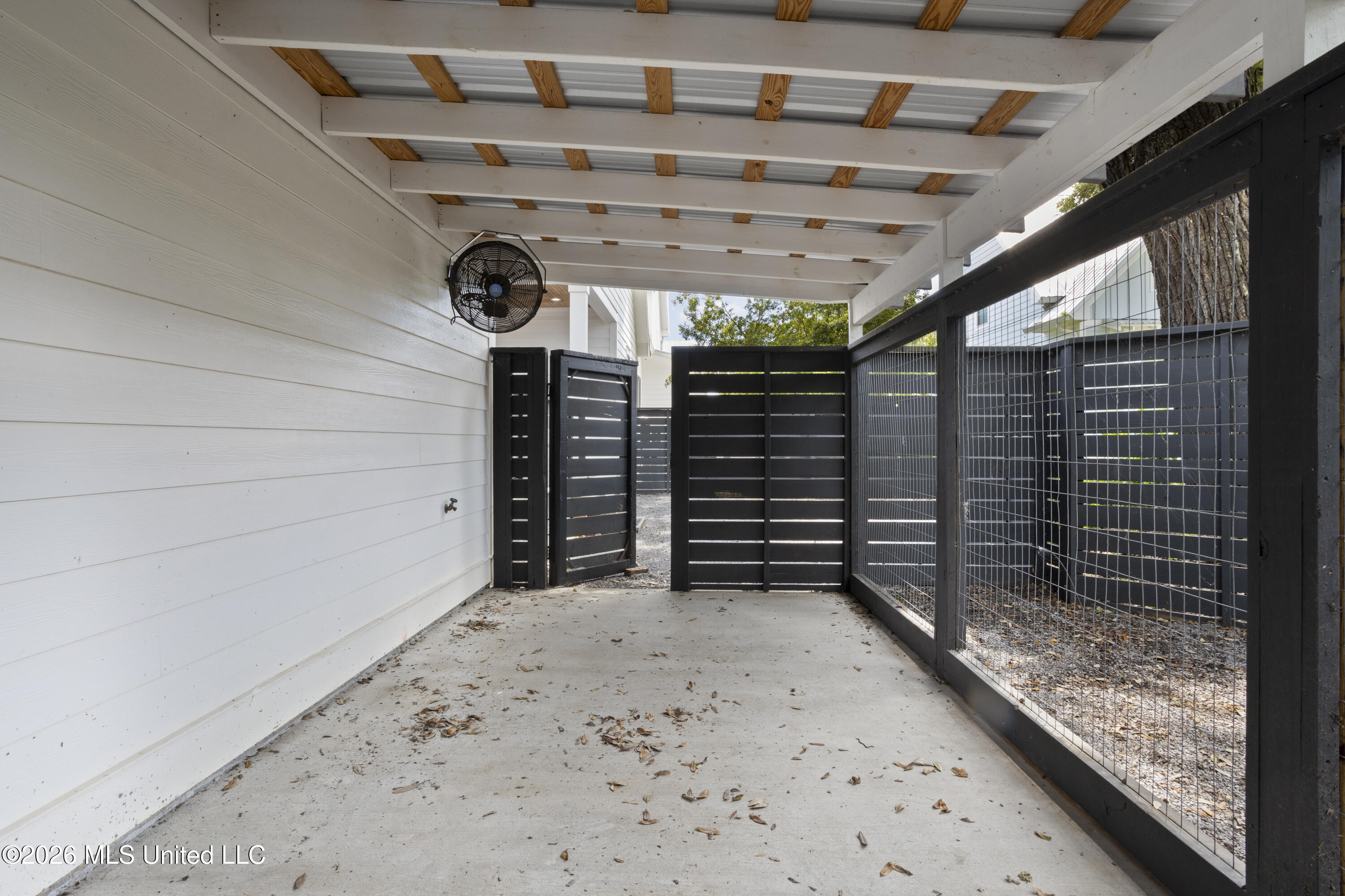 305 Beach Hill Road Ocean Springs, MS 39564 - Photo 48 of 63 Side of carport