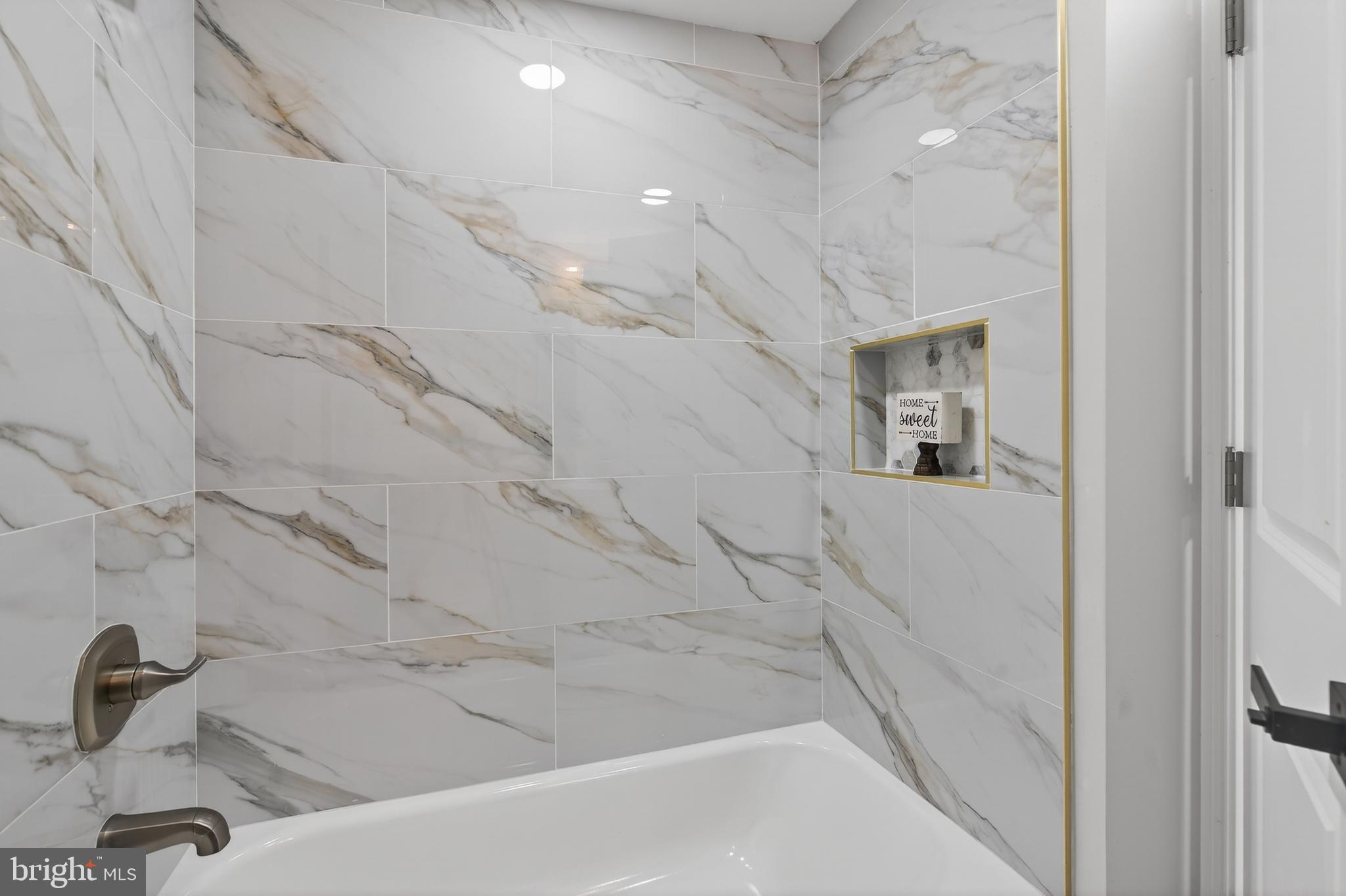 226 Ruth Avenue Maple Shade, NJ 08052 - Photo 17 of 32 a bathroom with a bathtub and a sink