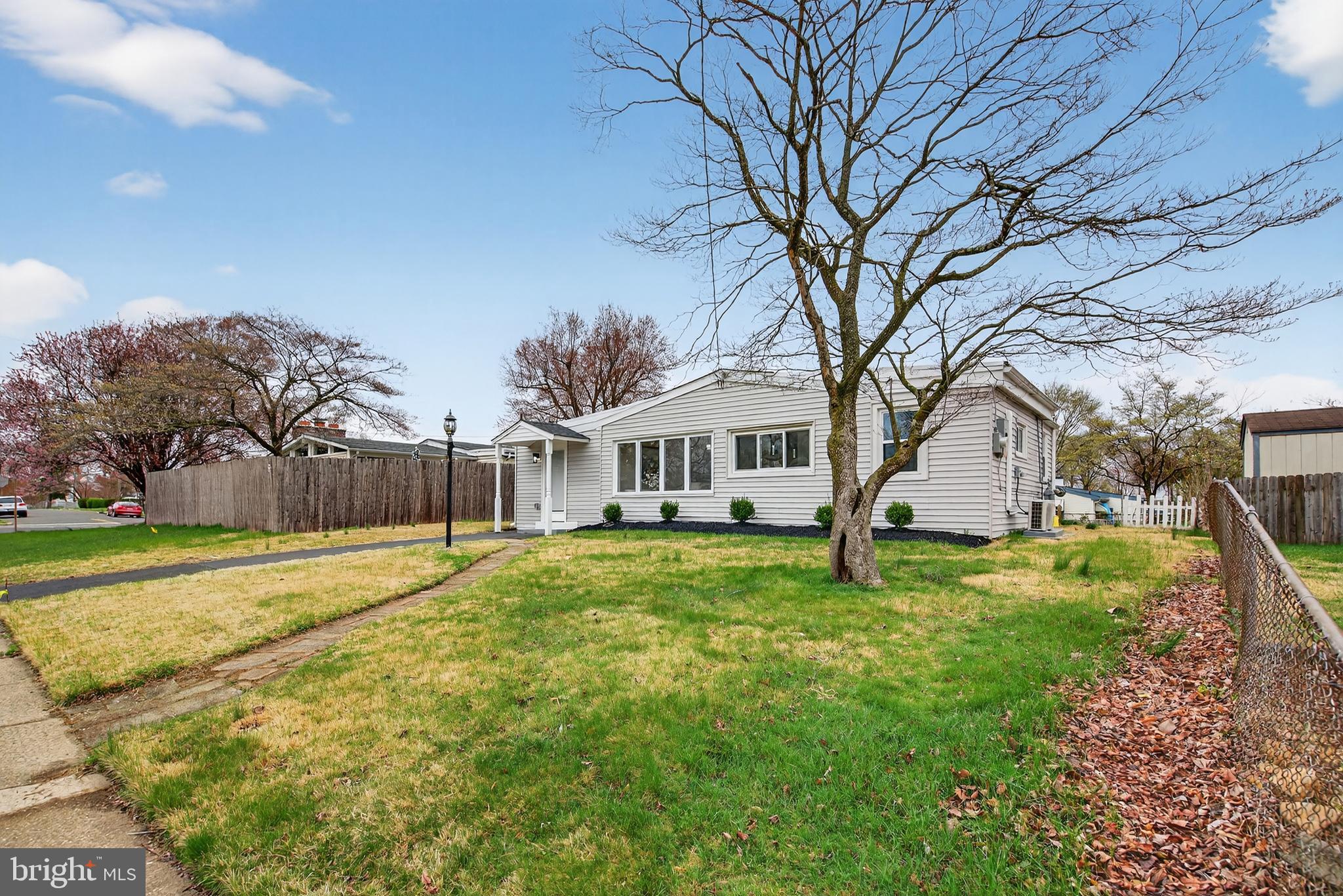 226 Ruth Avenue Maple Shade, NJ 08052 - Photo 3 of 32 a house with trees in front of it