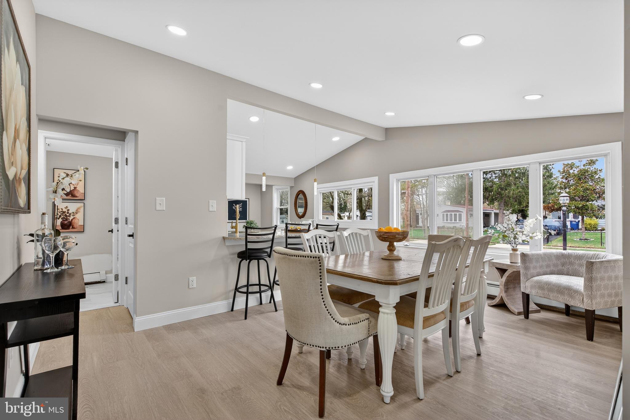 226 Ruth Avenue Maple Shade, NJ 08052 - Photo 8 of 32 a dining room with furniture and a floor to ceiling window