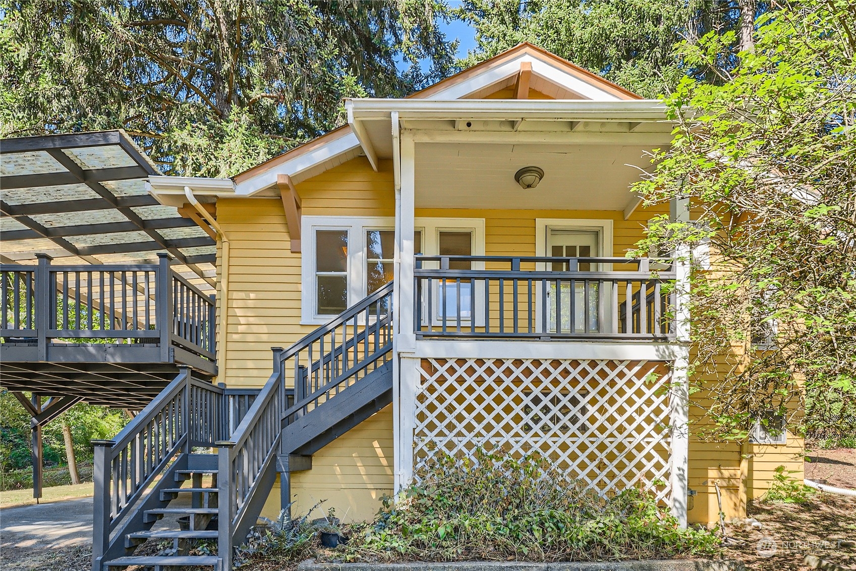 18045 120th Avenue Southeast Renton, WA 98058 - Photo 17 of 23 a front view of a house with balcony