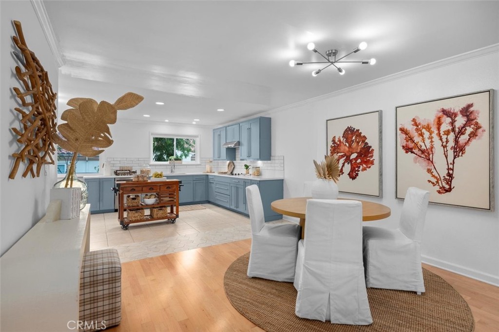 1200 Opal Street, Unit 7 Redondo Beach, CA 90277 - Photo 11 of 40 a living room with furniture and a chandelier