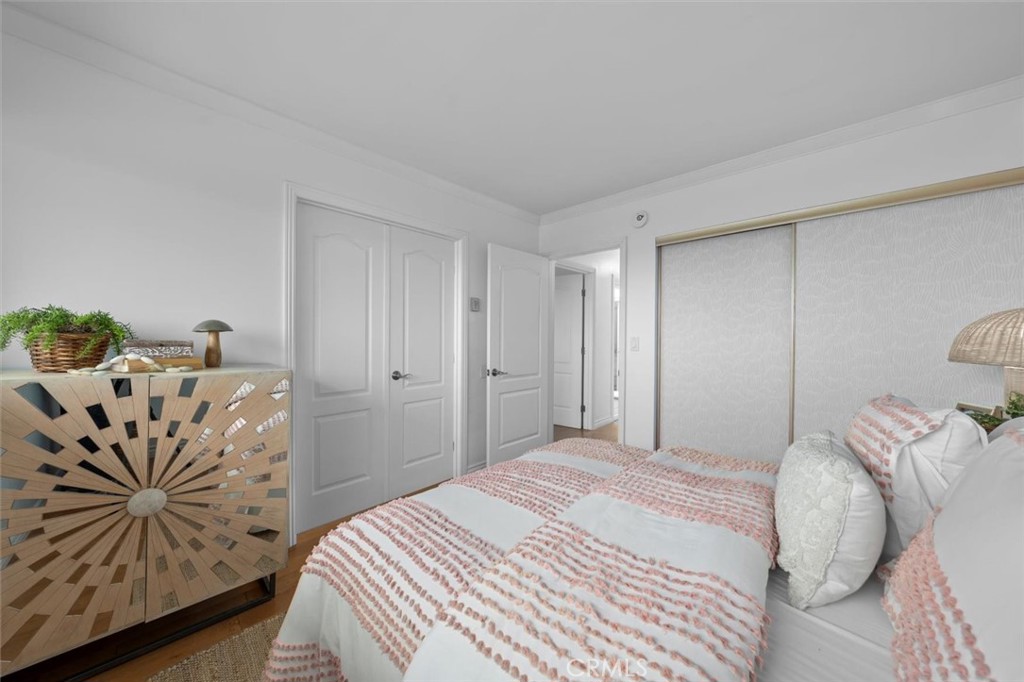 1200 Opal Street, Unit 7 Redondo Beach, CA 90277 - Photo 26 of 40 a bedroom with a bed and window