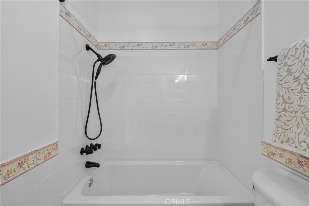1200 Opal Street, Unit 7 Redondo Beach, CA 90277 - Photo 31 of 40 a bathroom with a bath tub with a shower