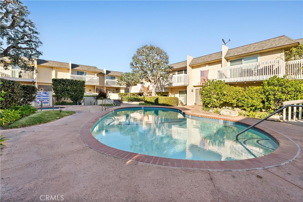 1200 Opal Street, Unit 7 Redondo Beach, CA 90277 - Photo 37 of 40 a view of a swimming pool with a porch
