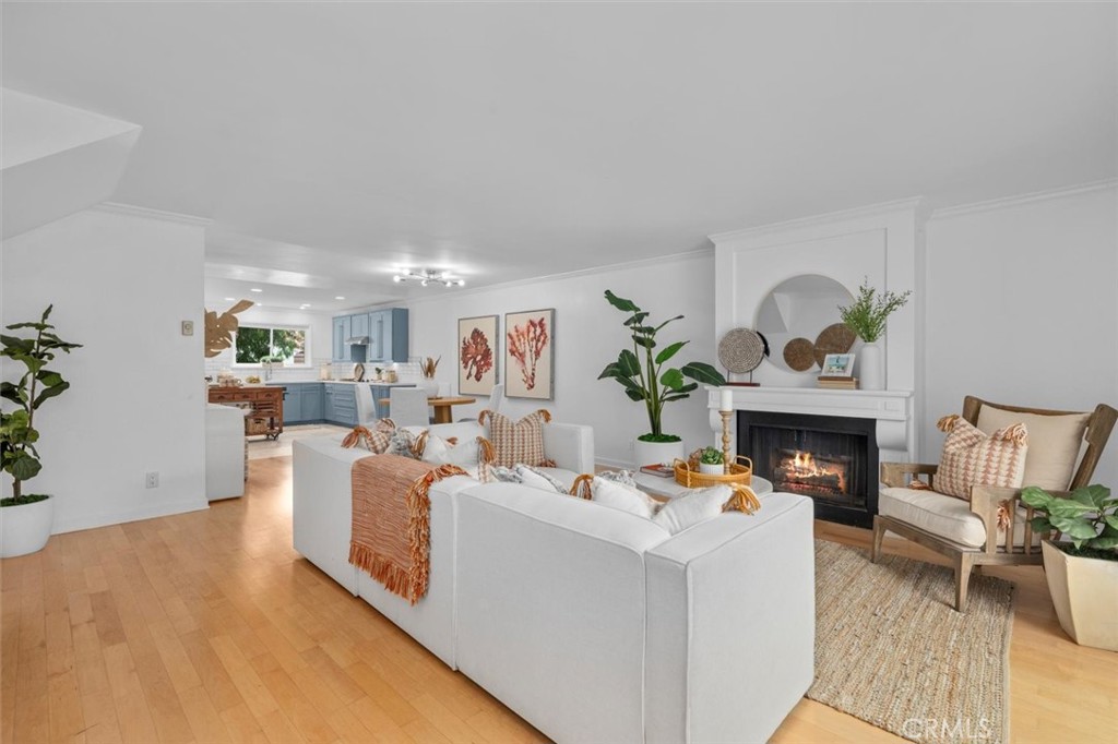 1200 Opal Street, Unit 7 Redondo Beach, CA 90277 - Photo 4 of 40 a living room with furniture and a fireplace