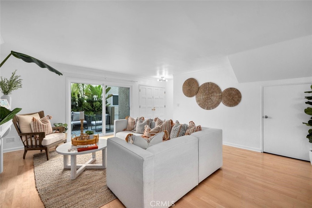 1200 Opal Street, Unit 7 Redondo Beach, CA 90277 - Photo 6 of 40 a living room with furniture and a large window