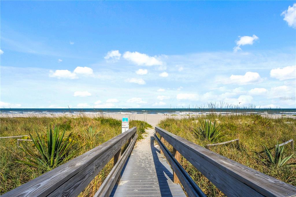 8700 Ridgewood Avenue, Unit 204B Cape Canaveral, FL 32920 - Photo 1 of 10 a view of ocean from a balcony