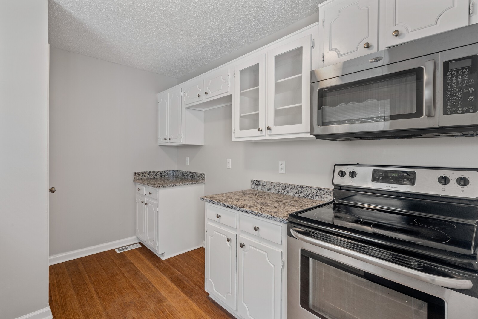 1617 Alsdale Road Mount Juliet, TN 37122 - Photo 11 of 34 a kitchen with a stove and a microwave