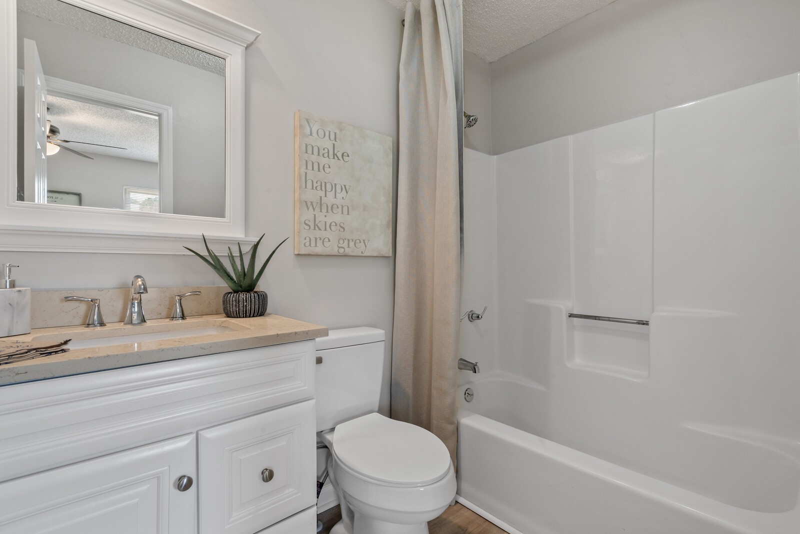 1617 Alsdale Road Mount Juliet, TN 37122 - Photo 16 of 34 a bathroom with a granite countertop sink toilet a mirror and shower