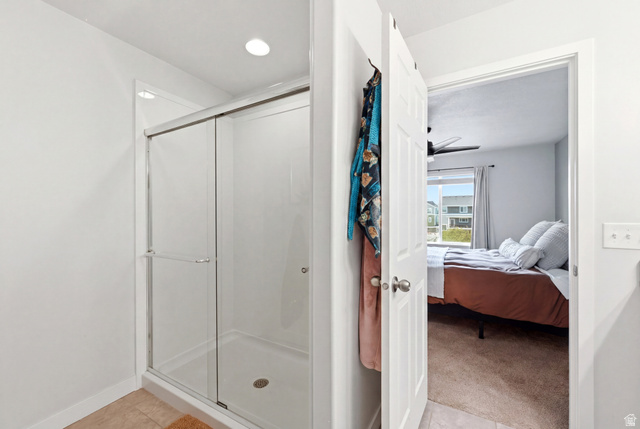862 Founders Point Lane South Midvale, UT 84047 - Photo 20 of 45 Shower enclosure with sliding glass doors and recessed lighting