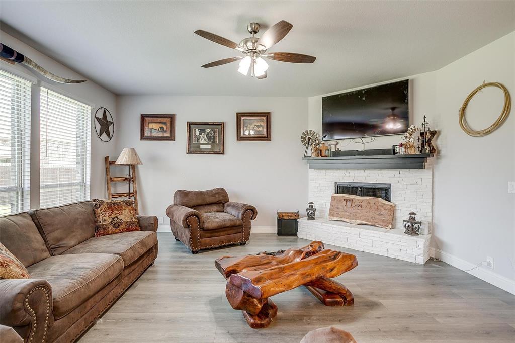 433 Joseph Lane Crowley, TX 76036 - Photo 17 of 40 a living room with furniture fireplace and flat screen tv