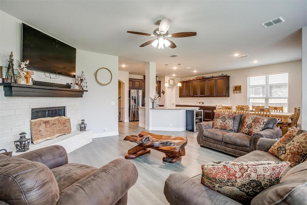 433 Joseph Lane Crowley, TX 76036 - Photo 20 of 40 a living room with furniture and a flat screen tv