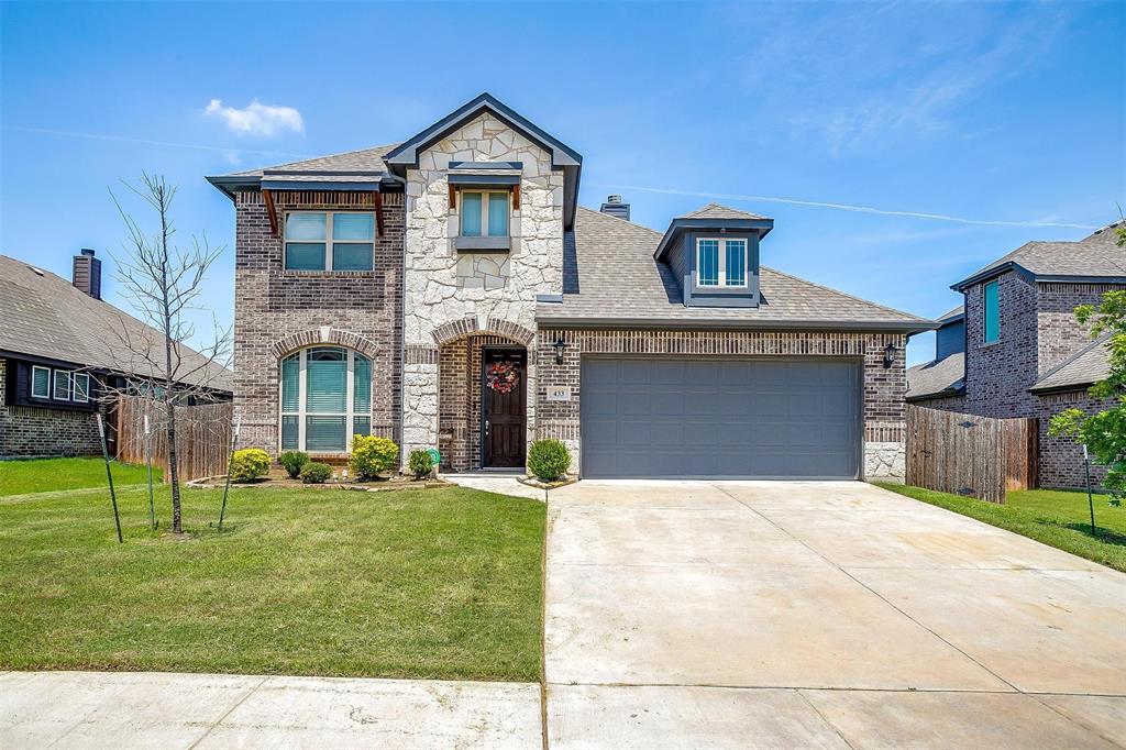 433 Joseph Lane Crowley, TX 76036 - Photo 2 of 40 a front view of a house with a yard