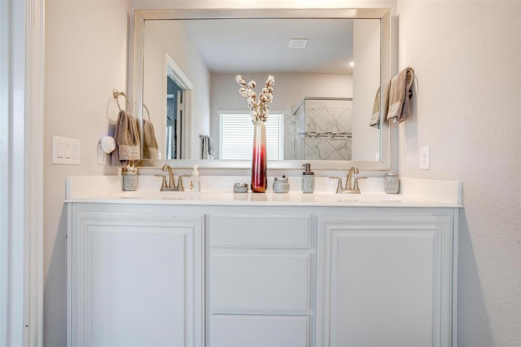 433 Joseph Lane Crowley, TX 76036 - Photo 26 of 40 a bathroom with double vanity sink and a mirror