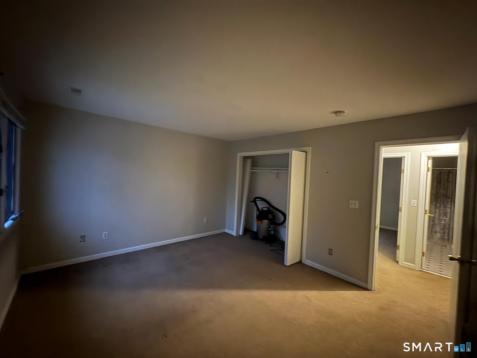 11 Park Road Hamden, CT 06517 - Photo 6 of 12 an empty room with closet