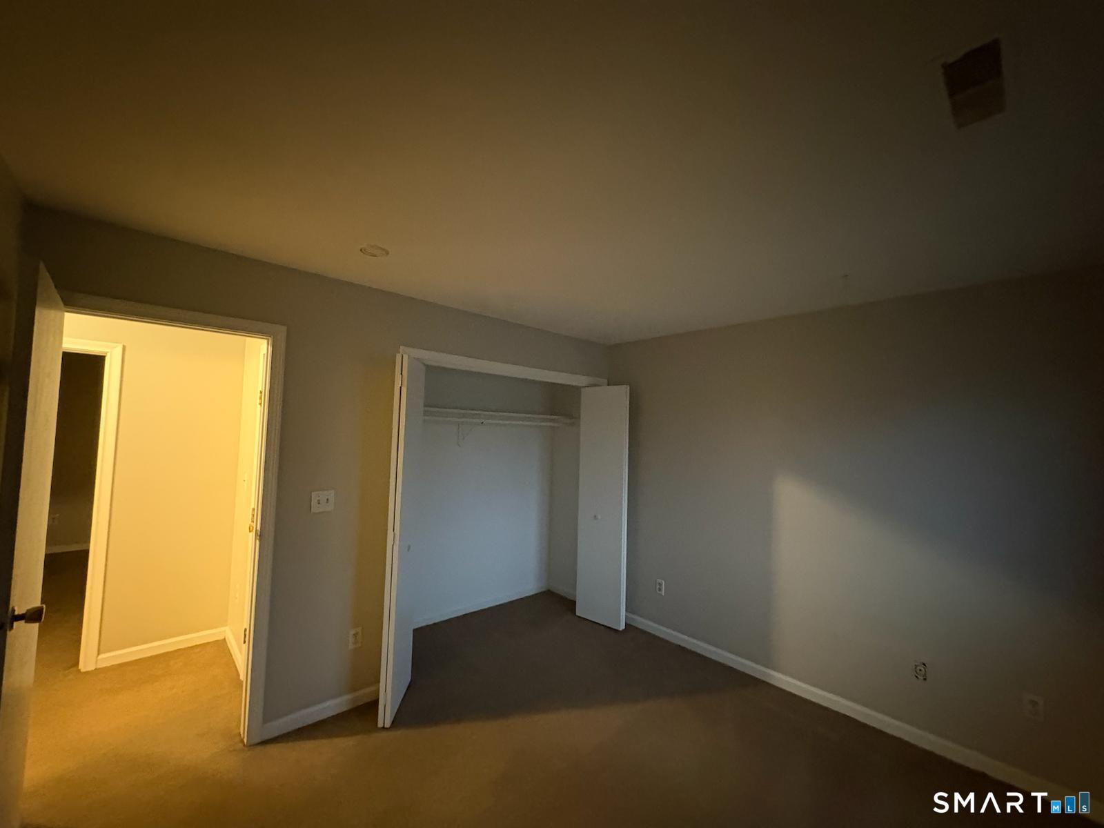 11 Park Road Hamden, CT 06517 - Photo 7 of 12 an empty room with windows