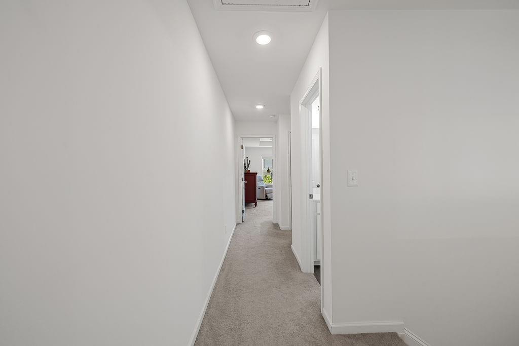 922 Edwin Lane Sugar Hill, GA 30518 - Photo 23 of 43 a view of a hallway with wooden shelves